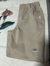 駱駝（CAMEL）運動(dòng)休閑女褲子防潑水梭織束腳運動(dòng)褲 J23CAVLR059 淡卡其 M 曬單實(shí)拍圖