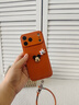 素洛適用蘋(píng)果17promax手機殼Air米奇手掌素皮皮紋iPhone16pro橙色簡(jiǎn)約小清新15高級感帶手繩14男女防摔 素皮皮紋橙色+米奇手掌+橙雙環(huán)橫版皮條+橙手繩 iPhone 17 Pro Max 曬單實(shí)拍圖