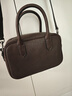 裘真【明星推薦】寬寬包植鞣牛皮休閑斜挎包手提保齡球包女 咖啡色 曬單實(shí)拍圖