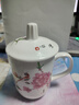 會(huì )議杯景德鎮陶瓷帶蓋水杯辦公杯商務(wù)茶杯家用茶樓用杯子單位定制 1#水點(diǎn)桃花【帶蓋杯】 400ml 曬單實(shí)拍圖