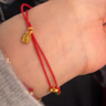 潮宏基 小如意黃金寶寶手鏈女足金小金圈本命年紅繩兒童禮物 計價(jià) 繩長(cháng)約15cm 1克 曬單實(shí)拍圖