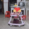 童樂(lè )嘉學(xué)步車(chē)防o型腿嬰兒防側翻多功能寶寶手推車(chē)可坐可推腳步車(chē)學(xué)行車(chē) 櫻花粉-普通輪餐盤(pán)款(促銷(xiāo)款) 曬單實(shí)拍圖