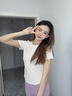 雙星（shuangxing）正肩短袖t恤女夏季圓領(lǐng)不規則下擺設計感修身內搭上衣 白色 S 曬單實(shí)拍圖