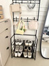 溫家瑞亞鞋架多層家用門(mén)口簡(jiǎn)易鞋架子入戶(hù)門(mén)后掛衣架一體鐵藝鞋柜出租房用 【經(jīng)典款】黑色3層長(cháng)60 曬單實(shí)拍圖