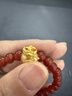 周六福  黃金轉運珠女款3D硬金琺瑯錢(qián)袋瑪瑙手串 定價(jià) 0.73g 曬單實(shí)拍圖