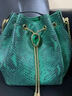 絲芙倫高級質(zhì)感真皮蛇紋水桶包洋氣2026秋冬新款純牛皮手提斜挎休閑女包 蛇紋綠色 4D469868BD 曬單實(shí)拍圖