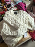 艾萊依輕薄羽絨服女春秋短款簡(jiǎn)約圓領(lǐng)時(shí)尚波紋輕暖外套 暖白色M 曬單實(shí)拍圖