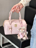 迪士尼（Disney）包包女款2026新款高級感輕奢小眾波士頓手提斜挎包生日禮物送女生 Disney獨角獸粉色+雪莉玫掛件 曬單實(shí)拍圖
