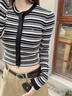 TOMMY JEANS26春夏新款女裝純棉優(yōu)雅撞色條紋修身短款圓領(lǐng)針織開(kāi)衫外套 黑白條紋BDS XS 曬單實(shí)拍圖