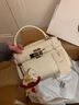 南風(fēng)Chio2nd四季通勤凱莉包包女高級感輕奢小眾手提包女士單肩斜挎包 米白色【送小馬掛件*1】 曬單實(shí)拍圖
