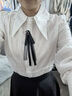 固執（OBSTINATE）2025秋季新款法式純色通勤氣質(zhì)立領(lǐng)荷葉長(cháng)袖襯衫女上裝 白色 S 曬單實(shí)拍圖