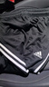 阿迪達斯（adidas）運動(dòng)褲男秋季防風(fēng)休閑衛褲健身跑步運動(dòng)褲 黑白收腿褲 M 曬單實(shí)拍圖