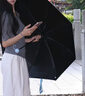 左都（ZUODU）膠囊五折太陽(yáng)傘超強防曬防紫外線(xiàn)遮陽(yáng)女晴雨兩用超小輕巧口袋便攜 曬單實(shí)拍圖