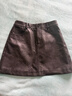 紅袖（hopeshow）復古風(fēng)半身裙2025冬季新款女裝氣質(zhì)百搭遮胯顯瘦A字PU皮短裙 烏云灰058 M 曬單實(shí)拍圖