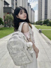 CALWAN KEODH書(shū)包女大學(xué)生初中雙肩包女2026新款時(shí)尚大容量背包輕便運動(dòng)電腦包 【米白色+長(cháng)腿毛球】小眾百搭高顏值簡(jiǎn)約休閑減負出游 曬單實(shí)拍圖