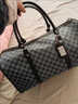 葉余恒嵐韓版男女士女神節短途旅游出差行李袋潮流黑格子手提包單 棋盤(pán)格 曬單實(shí)拍圖
