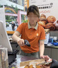 圣拓服務(wù)員工作服短袖T恤定制印Logo夏季飯店超市烘焙店工裝POLO衫女 橙色 L 曬單實(shí)拍圖