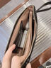 金利來(lái)（Goldlion）女士手拿包2026新款真皮大容量高檔時(shí)尚媽媽包漆皮手包化妝包女包 黑色【官方授權-假一罰十】 曬單實(shí)拍圖