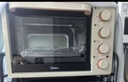 美的（Midea）多功能家用電烤箱30升 機械式操控 專(zhuān)業(yè)烘焙易操作 烘烤蛋糕面包PT3031 曬單實(shí)拍圖