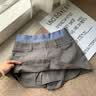 BJHG不計后果 學院風短裙女款2026新款夏季潮流高腰撞色A字半身裙短褲 隕石灰 S 曬單實拍圖