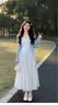 妍莉芬（yanlifen）巨好看白色碎花吊帶連衣裙子女夏季2026新款韓系穿搭女裝套裝長(zhǎng)裙 藍(lán)色開(kāi)衫+白色連衣裙【套裝】 S 40/45kg 曬單實(shí)拍圖
