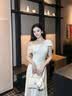 Mandy Zhang法式千金流光緞面白色一字領連衣裙女夏季新款氣質蝴蝶結禮服長裙 珍珠白-短袖 L 曬單實拍圖