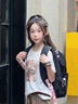叢林鳥高顏值書包女2026新款大容量雙肩包初高中學生簡約休閑背包校園風 黑色【藍背帶褲歪脖熊】 曬單實拍圖