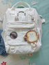 好奇貓（Haoqimao）書(shū)包女韓版初中生高中生高顏值大容量雙肩包小學(xué)生大學(xué)生手提背包 白色【帶吐司掛件】 曬單實(shí)拍圖