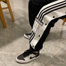 阿迪達斯 （adidas）三葉草網(wǎng)女褲 新款運動(dòng)褲潮流時(shí)尚排扣褲子透氣舒適休閑長(cháng)褲子男 GJ6580/店長(cháng)推薦 L 165 曬單實(shí)拍圖
