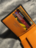 花虎（HANATORA）短款折疊錢(qián)包多功能大容量多卡位零錢(qián)位真皮男女送禮情人節禮物 黑色+橙色 曬單實(shí)拍圖