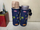 名奧（mingao） 通用卡通兒童杯套袋保溫杯手提可斜挎保護套水杯子可愛(ài)背帶防燙摔 A500提繩大號 深藍恐龍 曬單實(shí)拍圖