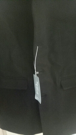 手感不错，就是穿着显得有点紧，再宽松一点更不错，还行吧