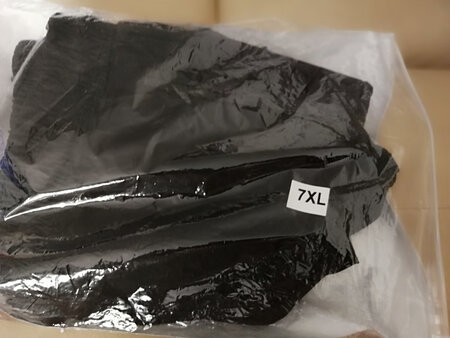 商品收到谢谢了质量不错就是有点廋不象7XL也许穿贯了B板裤子。快递很快哦谢谢?了！