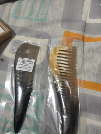 质量还行外观没准，使用笨重。有一把难看死了。