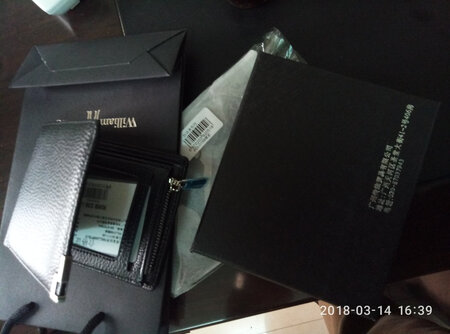 货收到。包装很实，钱包做很好，是真皮，内部格式与描述的一致。查是正品。