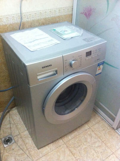 西门子WM08X168TI:说是硬币放洗衣机上面不