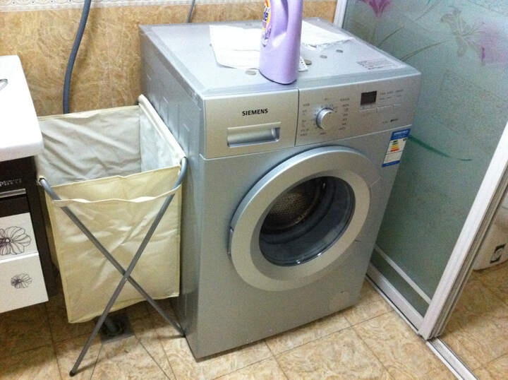 西门子WM08X168TI:说是硬币放洗衣机上面不