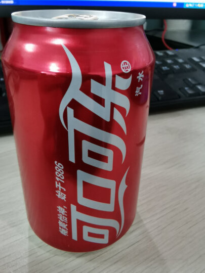 可口可乐 Coca-Cola 汽水 碳酸饮料 330ml*24罐 整箱装 可口可乐公司出品 新老包装随机发货 晒单图