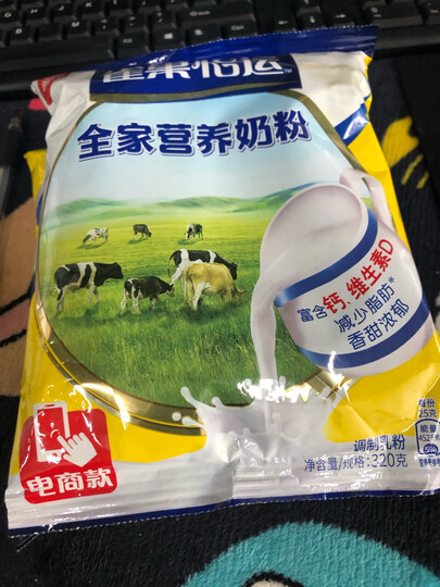 雀巢(Nestle) 成人奶粉 全家营养甜奶粉 维生素D 调制牛奶粉袋装320g (新老包装交替发货) 晒单图