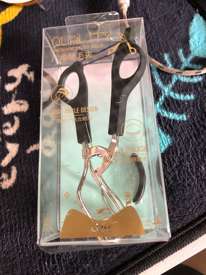 悠珂思(ukiss)浓睫娃娃超广角睫毛夹(小巧迷你便携式睫毛卷翘器 持久卷翘含胶垫替换垫) 晒单图