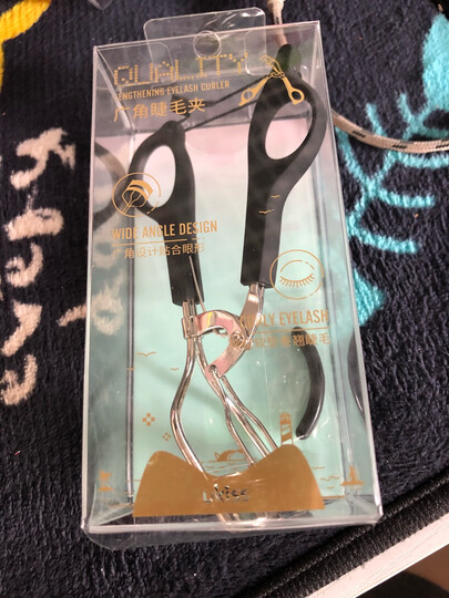悠珂思(ukiss)浓睫娃娃超广角睫毛夹(小巧迷你便携式睫毛卷翘器 持久卷翘含胶垫替换垫) 晒单图