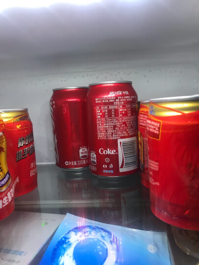 可口可乐 Coca-Cola 汽水 碳酸饮料 330ml*24罐 整箱装 可口可乐公司出品 新老包装随机发货 晒单图