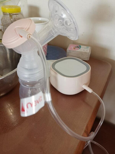 新贝 吸奶器 电动吸奶器 防逆流专利吸乳器 按摩无痛吸力大8615 晒单图