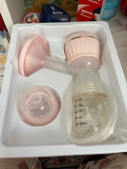 新贝吸奶器
