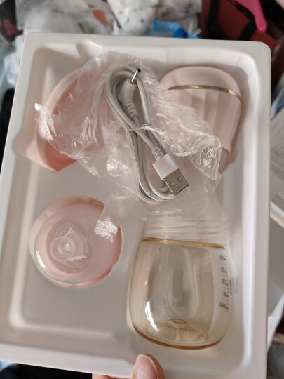 新贝吸奶器