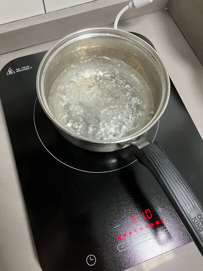 美的(Midea)电磁炉 火锅炉匀火 智能定时 十档火力 C21-WT2118(标配欧式汤锅+炒锅) 晒单图