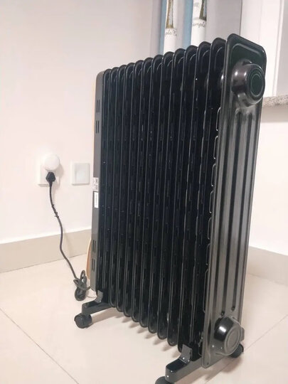 美的(Midea)取暖器/电暖器/电暖气片家用机 节能省电 低噪加湿烘衣 13片大面积劲暖电热油汀NY2513-16JW 晒单图