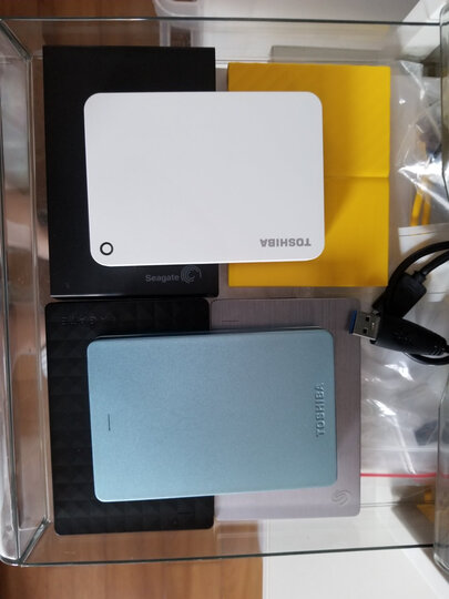 东芝(TOSHIBA) 2TB USB3.0 移动硬盘 V9系列 2.5英寸 兼容Mac 轻薄便携 密码保护 轻松备份 高速传输 清新白 晒单图