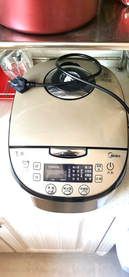 美的(Midea)电饭煲电饭锅4L智能预约电饭煲气动涡轮防溢金属机身圆灶釜内胆家用多功能电饭煲MB-WFS4037 晒单图