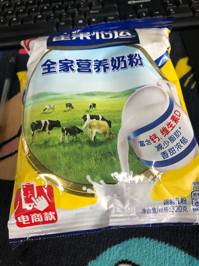 雀巢(Nestle) 成人奶粉 全家营养甜奶粉 维生素D 调制牛奶粉袋装320g (新老包装交替发货) 晒单图